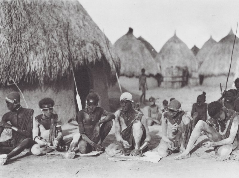 Africa: Shilluk Warriors Rubbing Themselves with Wood Ashes by Hugo Adolf Bernatzik
