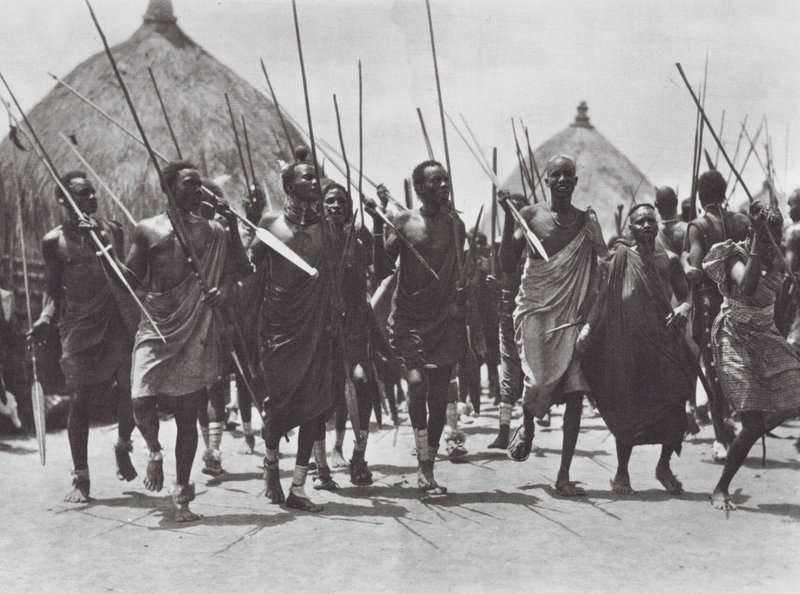 Africa: Shilluk warriors storming the grave of a chief by Hugo Adolf Bernatzik