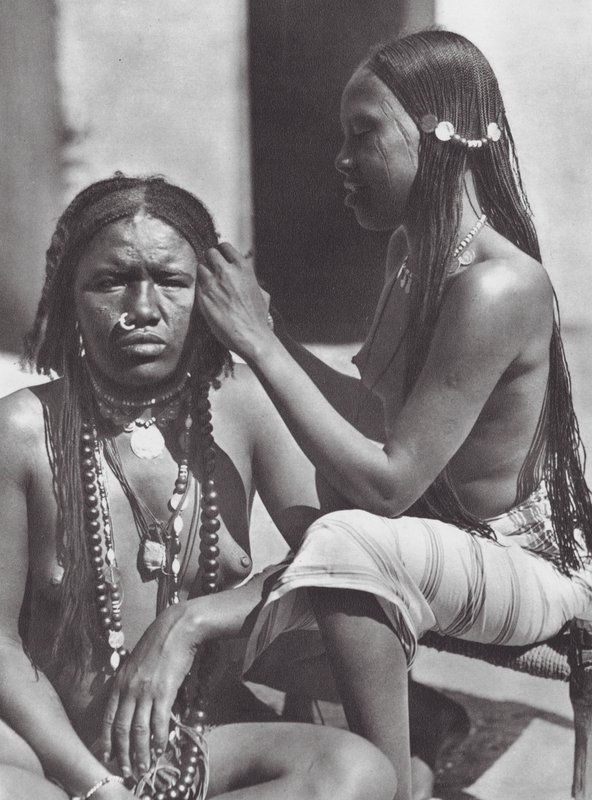 Sudanese women plaiting hair by Hugo Adolf Bernatzik