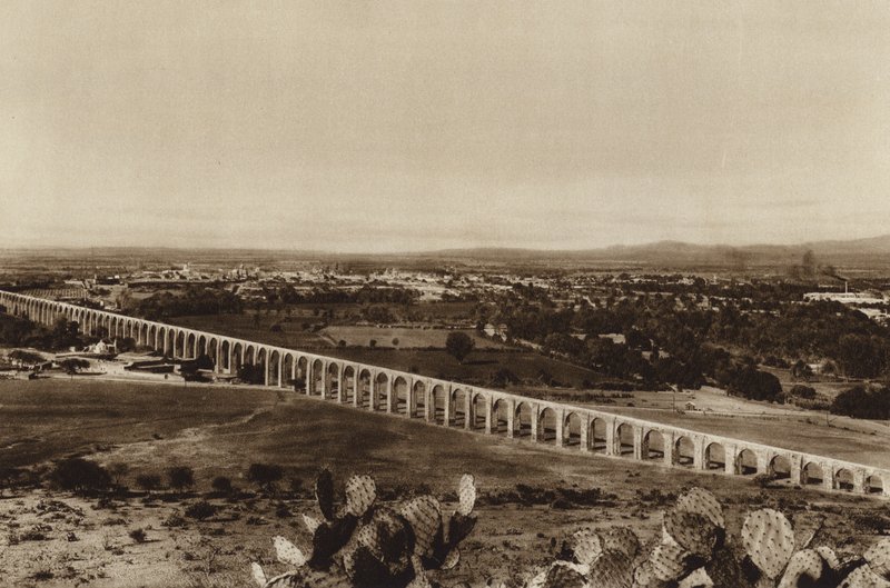 Mexico: View of Queretaro with ancient water pipe by Hugo Brehme