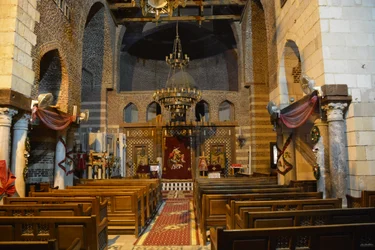 Interior of Saint Mercurius Church Abu Sefein in Old Cairo, historic Coptic Orthodox church with icons and wooden iconostasis