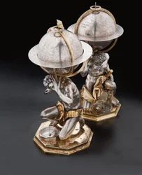 Two exceptional terrestrial and celestial globes, supported by Hercules and Atlas, Augsburg