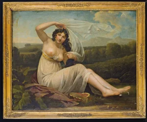 Young Woman Sitting in a Landscape