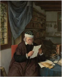 A Lawyer Seated at a Table Reading a Letter