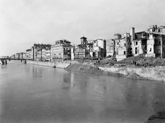 World War II: the rubble along the Arno River in Florence, after the bombing. This photograph, formerly part of the Brogi Collection, now belongs to the Alinari Collection