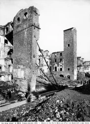 World War II: the rubble on Via Por Santa Maria with the Towers of the Baldovinetti and Amidei in Florence, after the bombing. This photograph was formerly part of the Brogi Collection, but now belongs to the Alinari Collection