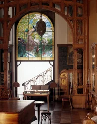 Art Nouveau: view of an apartment Modern style with stained glass by Alphonse Mucha, Musee des Arts Decoratifs Paris