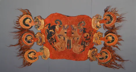 Saddle cover decorated with griffins attacking mountain goats
