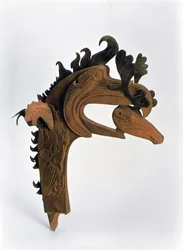 Terminal depicting a griffin holding a deer in its beak, from the Pazyryk Burial Mounds, 5th century BC