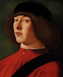 Portrait of a man, bust-length, with a green background