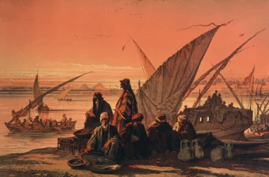 Boats on the Nile River, near the pyramids