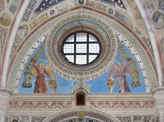 Angels with Shields Holding Garlands