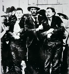 Bob and Grat Dalton with law officers