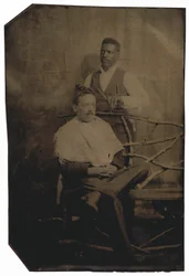 Portrait of a Man Cutting Hair