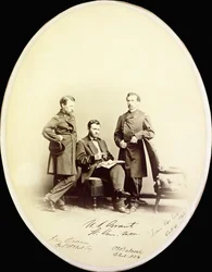 Signed photograph of Ulysses S. Grant and his aides, Orville E. Babcock and Adam Badeau, in military uniform, c. 1865