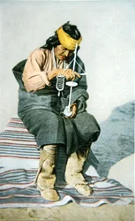 Pueblo man drilling turquoise, c.1905