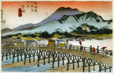 The Morning Glow at the Nihonbashi (55th station). Woodcut by Hiroshige in: Fifty Three Stations of the Tokaido (1833-1834). Postcard, Japan, c.1900