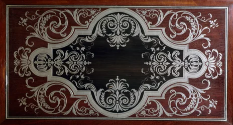 Decoration on Inside of Ebony Cabinet Door
