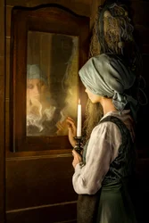 Woman Reflecting by Candlelight