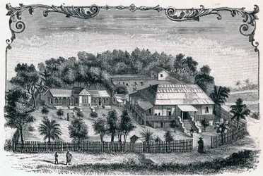 Exterior view of the rectory and school of Hell Ville (Andoany), capital of the island of Nosy Be in Madagascar. Engraving in 