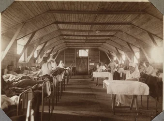 First World War 1914-1918: Wounded Soldiers and Nurses of the French Red Cross, Camp of Couville in the English Channel, Lower Normandy, France. Anonymous Photograph July 1917. Private Collection, Stella.
