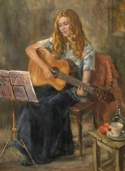 Nichola playing her guitar