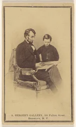 President Lincoln Reading The Bible to His Son Tad
