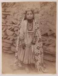 Girl adorned in silver jewellery