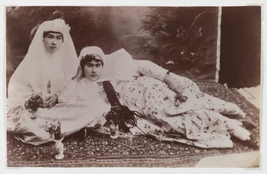 Women posing with bouquets