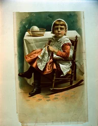 A Child Knitting