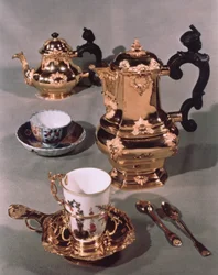 Teapot, sugar bowl, chocolate pot and mug, from a Meissen breakfast service made by Domanek, Vienna, 1750