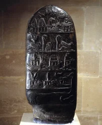 Oriental antiquity: stele (or kudurru, record of a land grant) in black limestone carved with bas-reliefs of King Meli-Shipak (or Melishipak) II (1186-1172 BC) in favor of his son Marduk-apla-iddina. They represent the great deities. From the site of Su