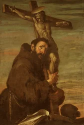 St Francis of Assisi embracing a crucifix