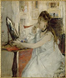 Young Woman Powdering Herself
