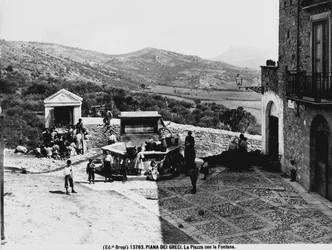 Piana dei Greci. The square with the fountain.