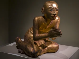 Monk Kneels in Prayer, Burma