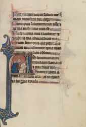 Initial A: A Noblewoman Seated on the Ground Reading
