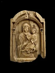 Icon of the Virgin Hodegetria gesturing to the Christ Child who sits on her left arm, holding a scroll in his left hand and blessing with his right