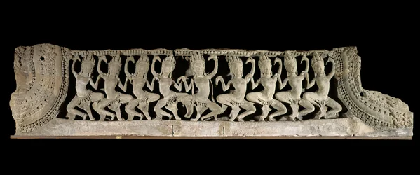 Arts of Khmer. Lower pediment register: nine dancing apsaras. Low relief in gres, late 12th - early 13th century. Bayon style. From Cambodia, Bayon temple. Paris, Musee Guimet - Musee national des Arts Asians