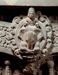 The god Indra in the center on Airavana and the Marut, the gods of the storm and the wind (Stone lintel, 600-650)