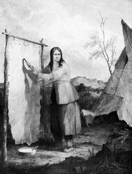 Indian Woman Dressing a Deer Skin, 1868