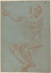 A Seated Man Holding a Tablet