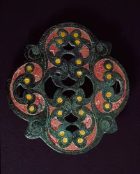 Celtic Art: Pierced Bronze Plate with Encrustation of Enamel. 1st Century AD. From Paillard (Oise). Breteuil, Archeological Museum