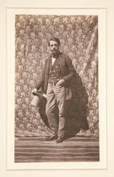 Portrait of a Standing Man with a Hat