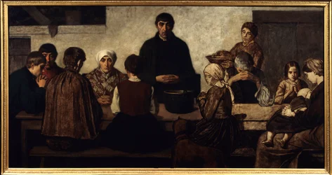 Benedicite Family praying at the table