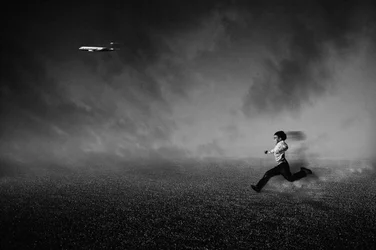 Boy Chasing Plane