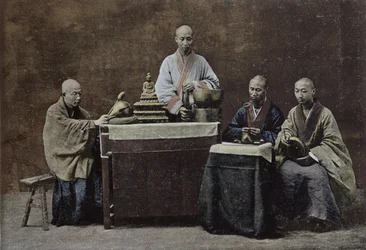 A group of Chinese bonzes; engraved and printed by Gilot; 1896