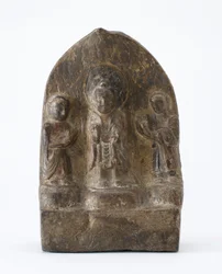Buddhist tablet depicting three standing figures, Period of Division, 536 AD