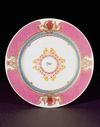 Dinner plate painted in Famille Rose enamels with the arms of the Grimaldi di Castro, Yongzheng period c.1735