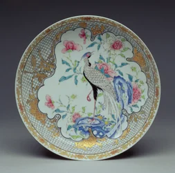 Dish painted with a long-tailed bird, rocks and flowers, Yongzheng Period, 1725-35